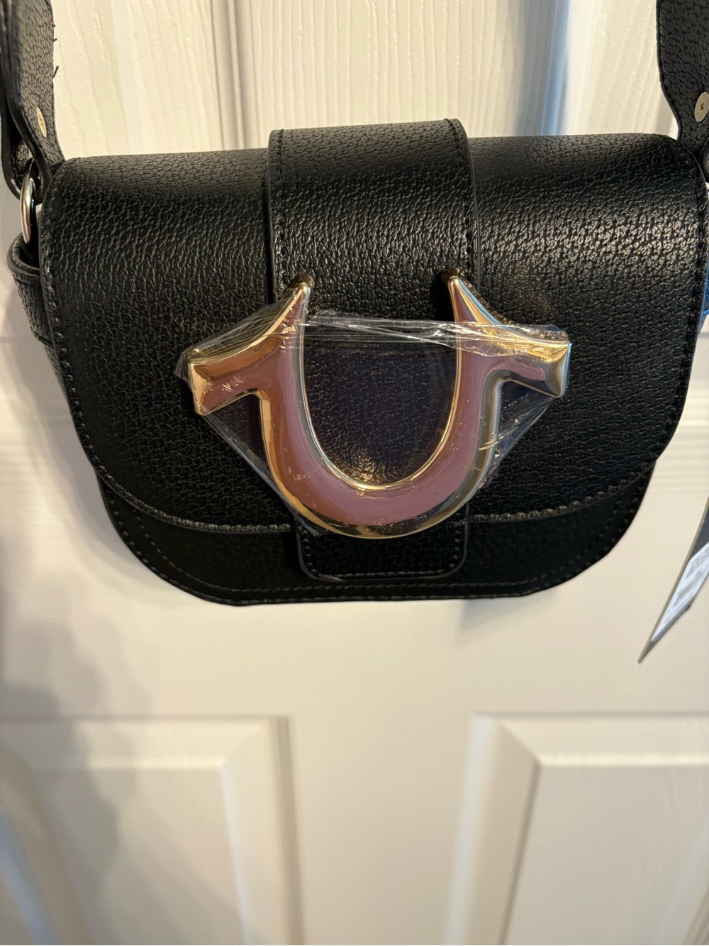 True Religion Black Crossbody Bag with Gold Horseshoe Accent